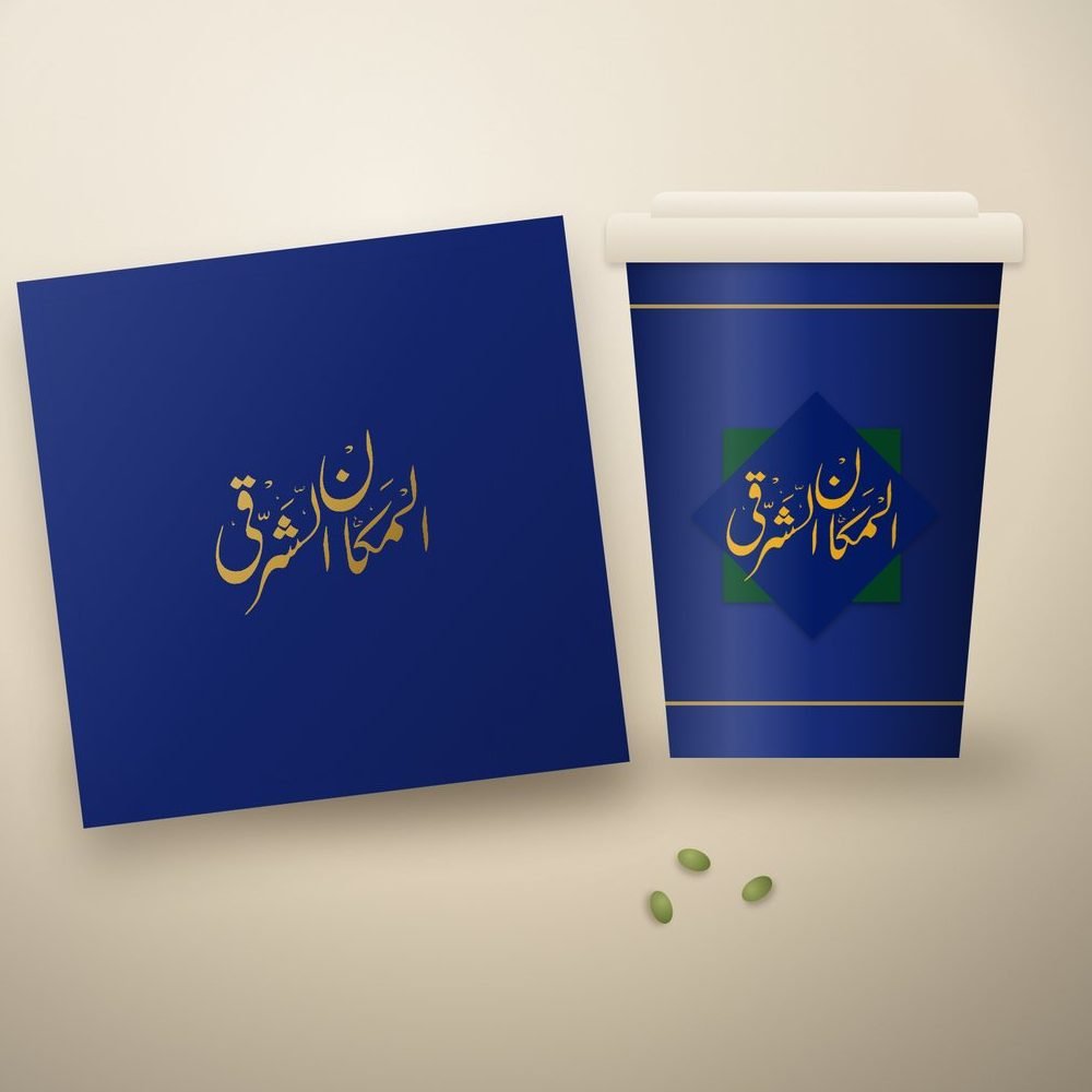 Takeaway cup and napkin carrying the logo